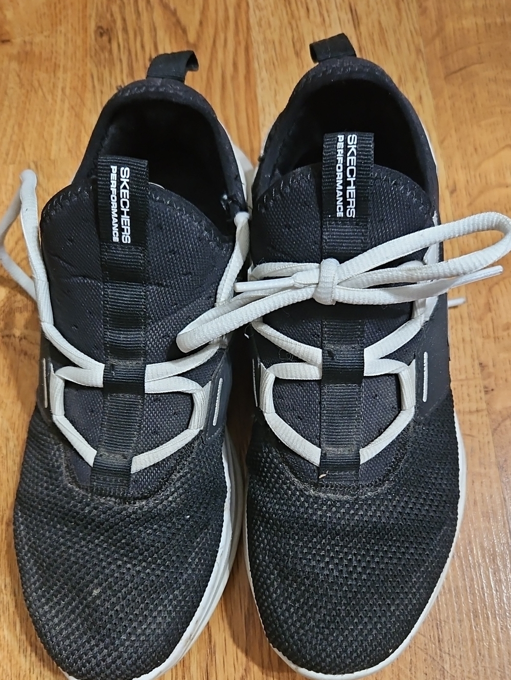 Skechers Men's Black Slip-On Athletic Sneakers with White Accents